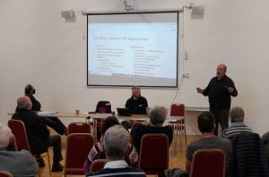 Listening to speakers at Buckland Brewer Climate Change Awareness Day